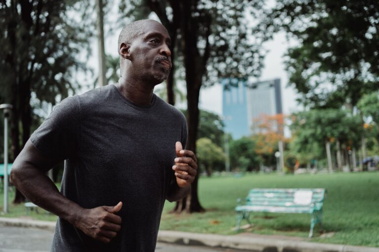Healthy man jogging after seeing results from his HitX TRT treatment.