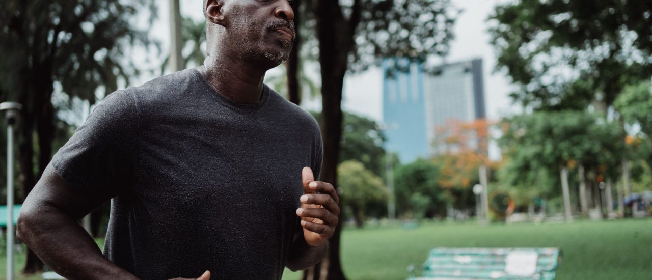 Healthy man jogging after seeing results from his HitX TRT treatment.
